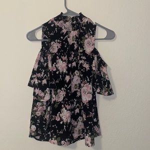 Black with pink flowers high neck cold shoulder top.